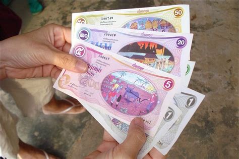 the currency made by the village of santi suk in thailand